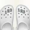 Jibbitz-schoenbedel met nummer 0
